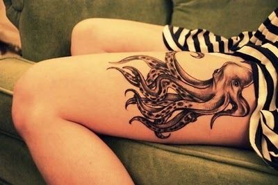 cool thigh tattoos