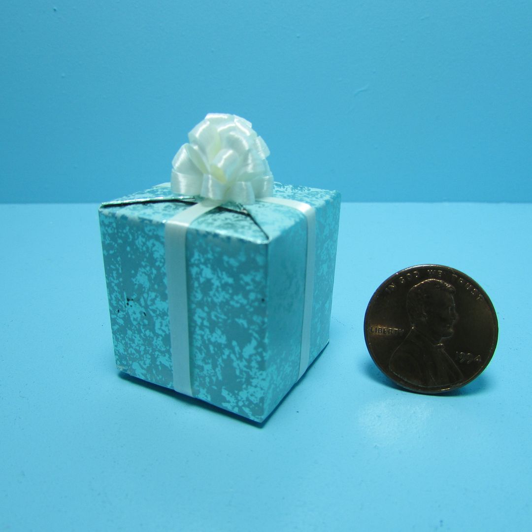 Dollhouse Miniature Wrapped Gift in Purple and Pink Foil with Bow CLD608